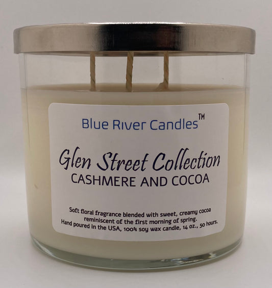 This Glen Street Collection in Cashmere and Cocoa has a floral sweetness blended with the creamiest cocoa. The fragrance brings warm and soothing memories of sitting in your favorite chair, in you PJs, with your knees to your chest, and a cup of warm cocoa between the palms of your hand that early morning on the first Saturday of spring. And your only concern at the moment was deciding whether to use one cube of sugar or perhaps two. The candle comes in 14 oz clear jar with stylish silver hammered lid.